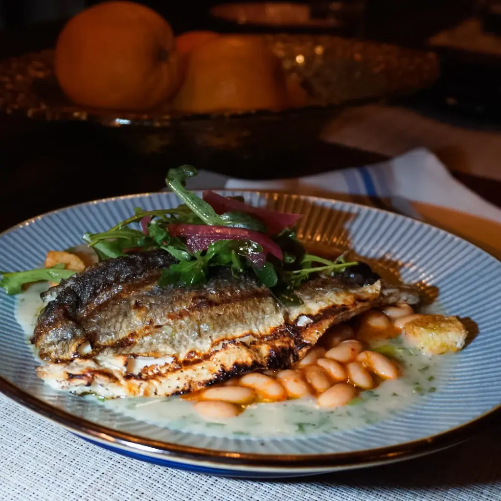 Branzino with fasolada and herb velouté at Alesta in Sebastopol