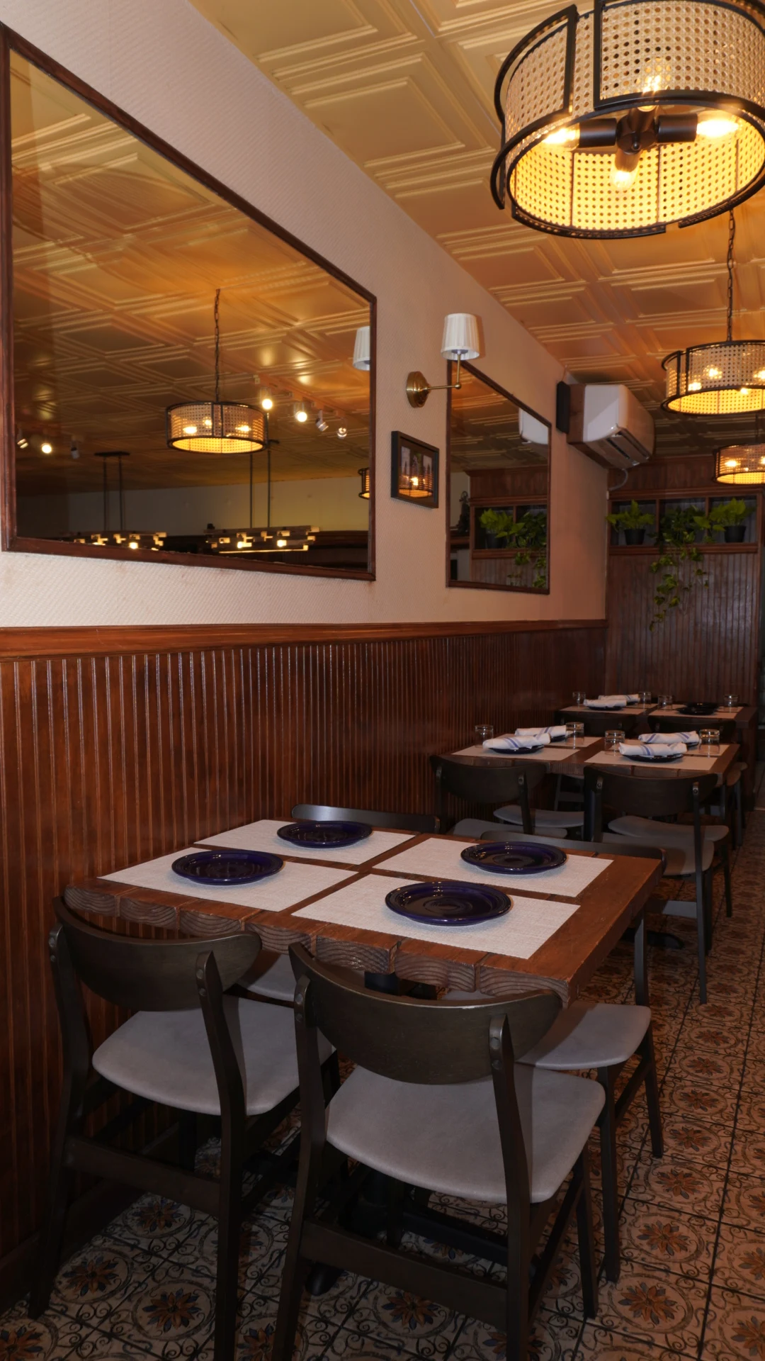 The Dining Room - Warm ambiance, candlelit tables, and Mediterranean hospitality