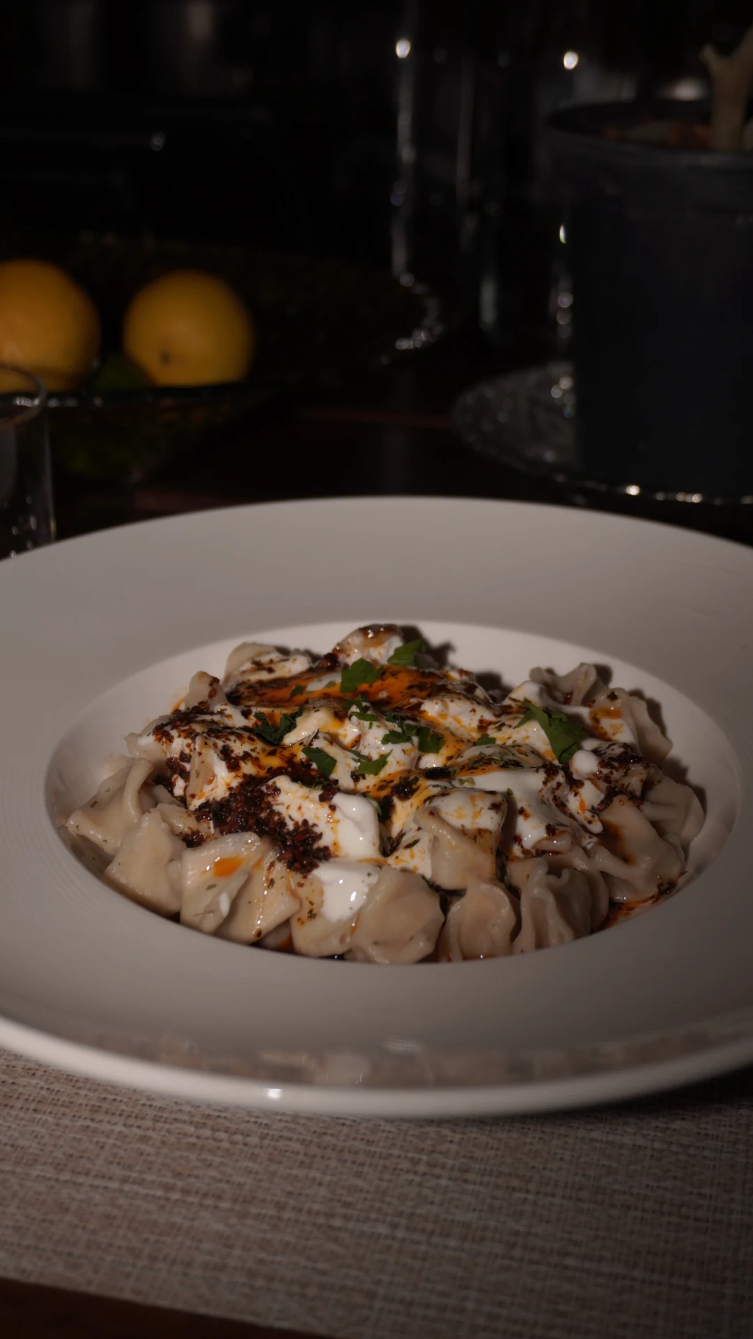 Manti - Turkish dumplings with yogurt, sumac butter, and fresh herbs